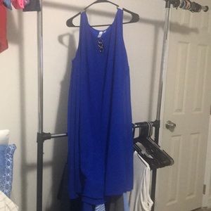 Blue knee length dress with bronze feature